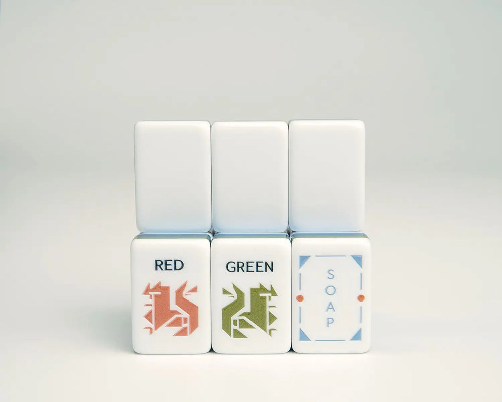 Blooming Geometry red, green and white dragon tiles with sky-blue backs