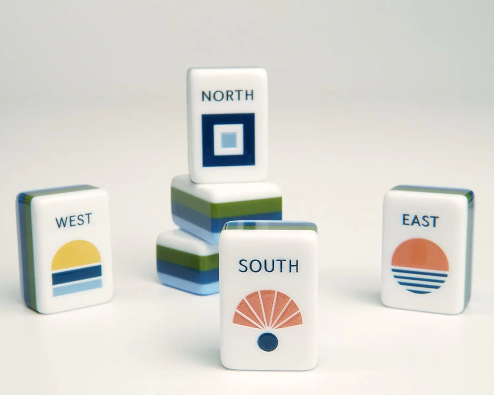 Blooming Geometry North, South, West and East wind tiles in a styled arrangement
