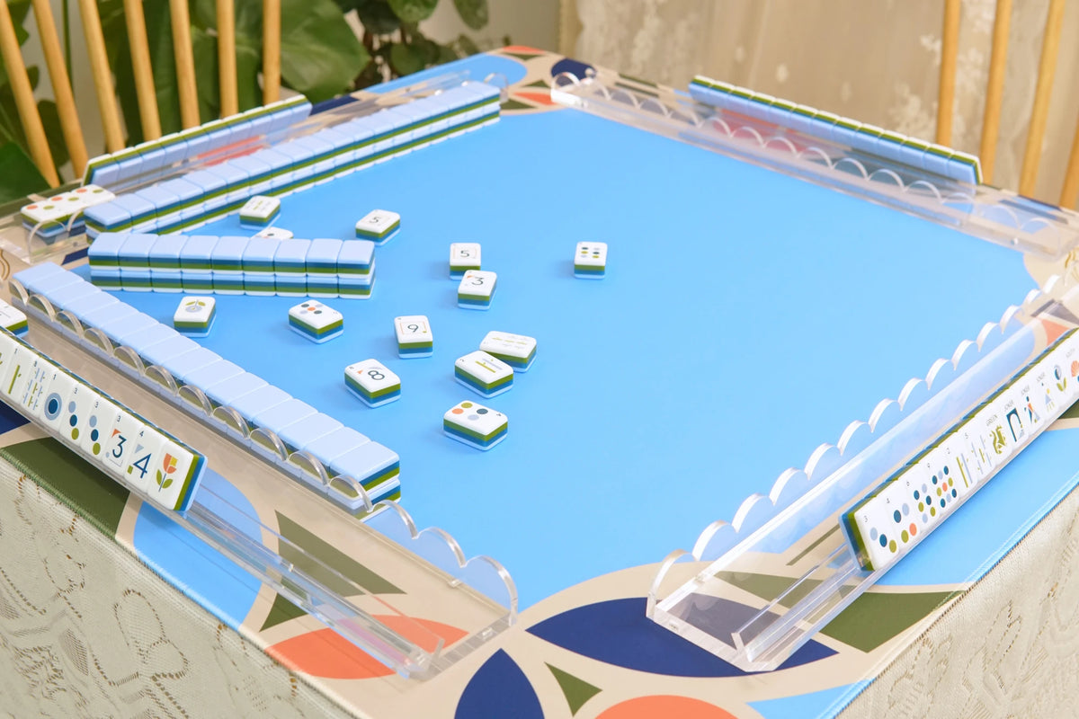 Blooming Geometry American Mahjong Set paired with Beige Geometry Mahjong Mat. Coordinating mat and racks sold separately.