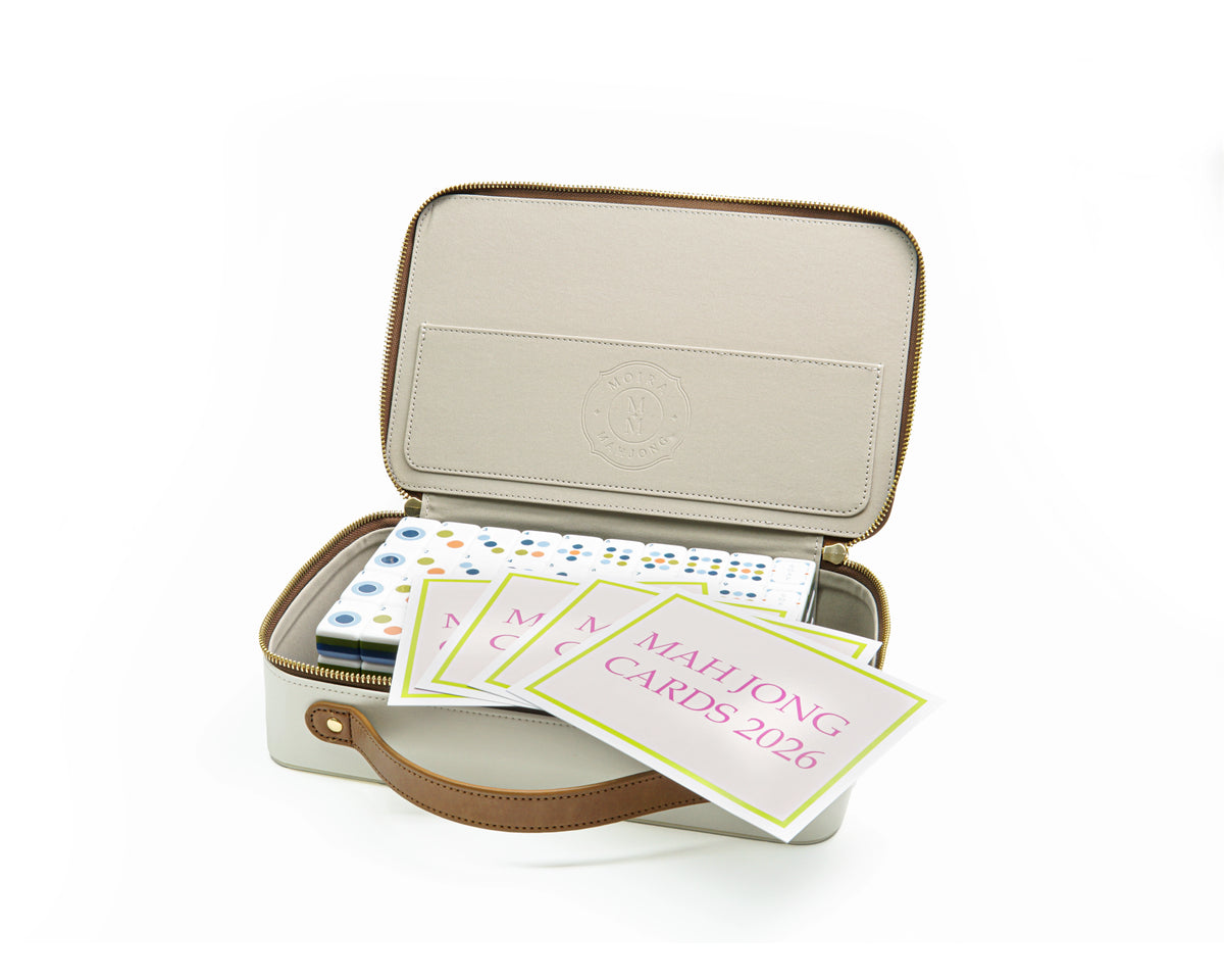 Blooming Geometry set packed in a cream storage case with four Mahjong rule cards