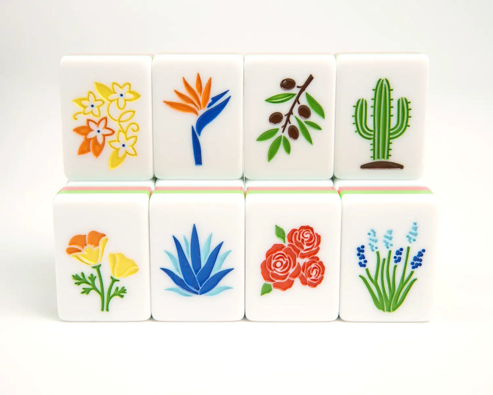 Eight Blue Manor flower tiles with resort botanical artwork