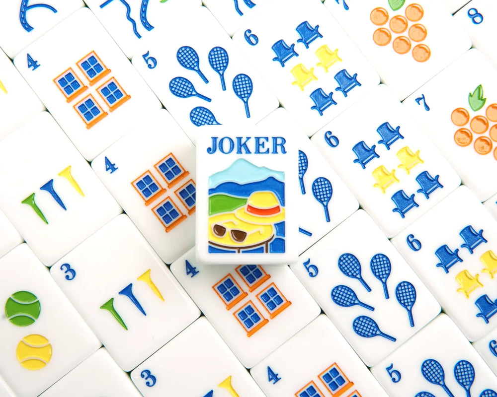 Close-up of Blue Manor numbered American Mahjong tiles and Joker