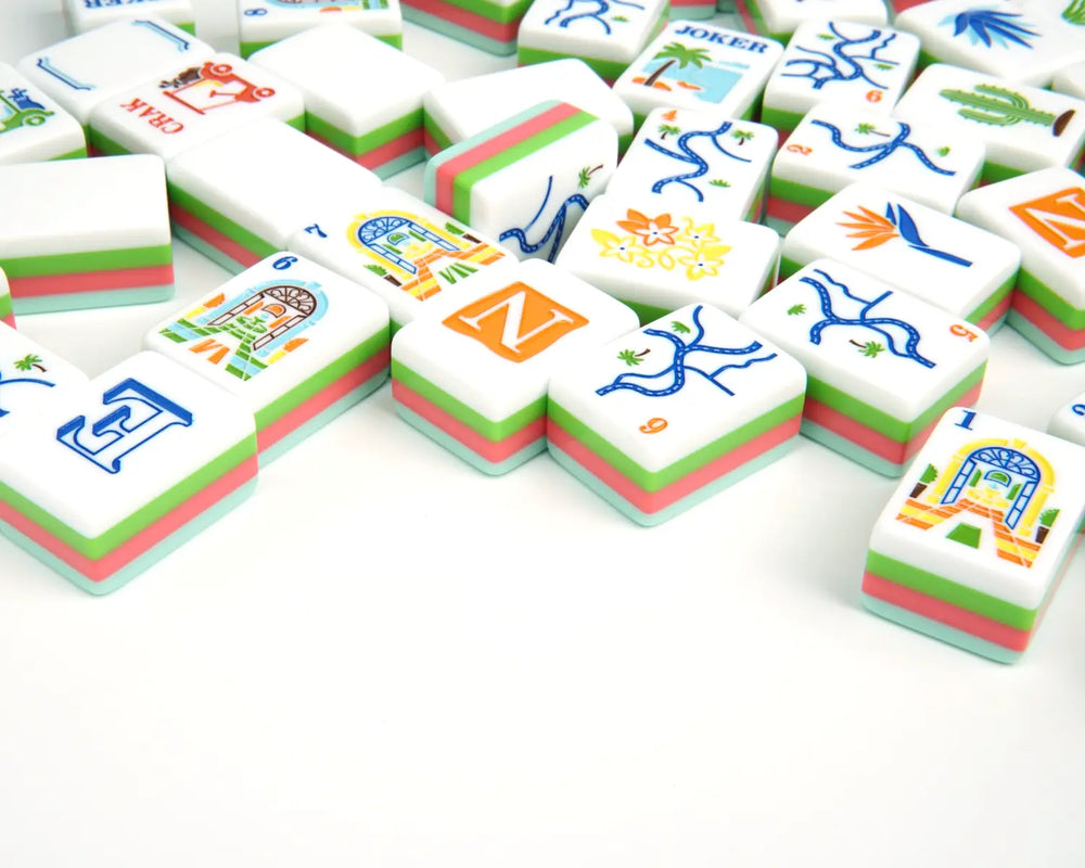 Overhead flat lay of Blue Manor American Mahjong tiles