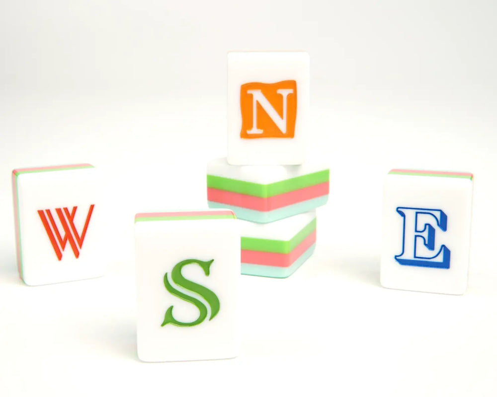 Blue Manor North, South, West and East wind tiles in a styled arrangement