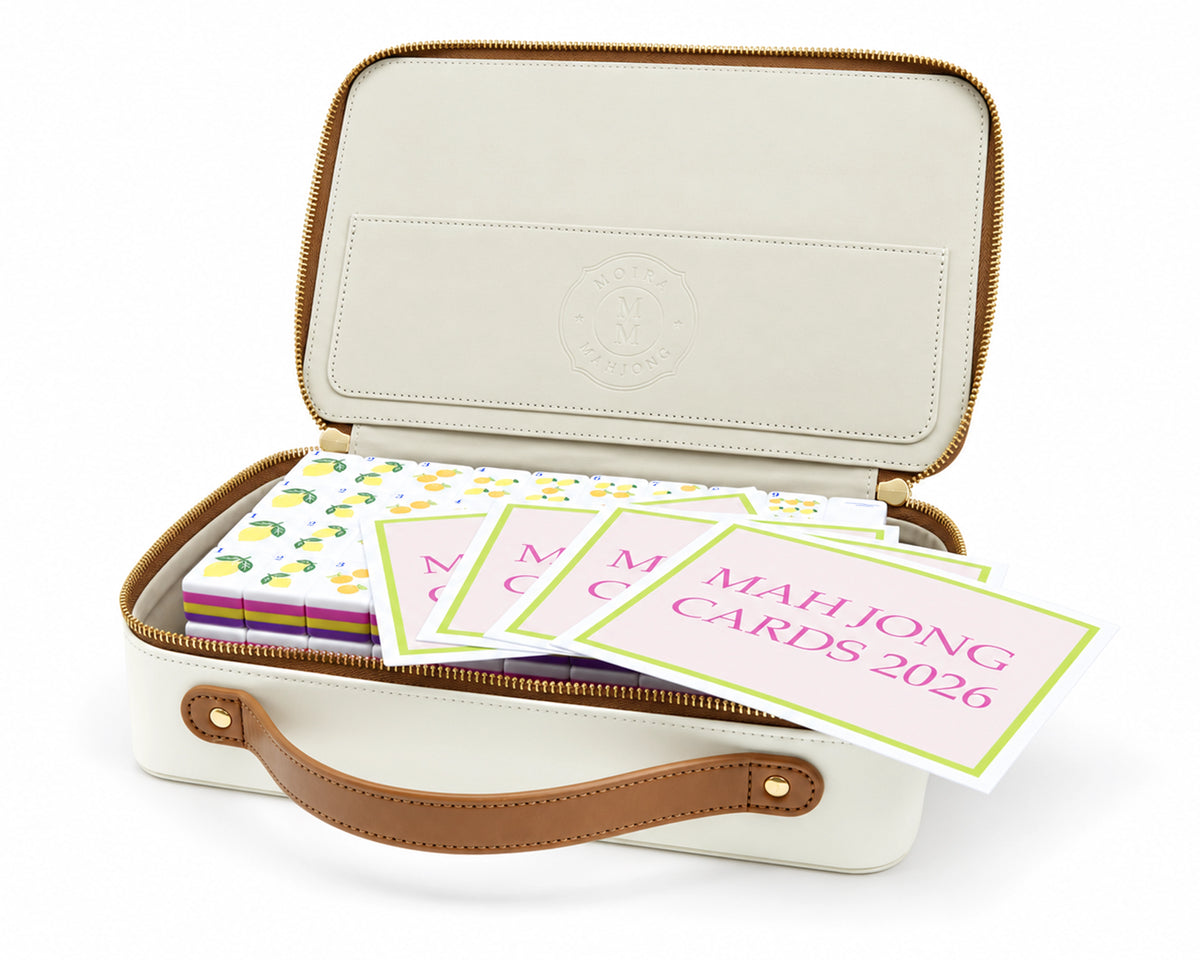 Capri Garden set packed in a cream storage case with four Mahjong rule cards