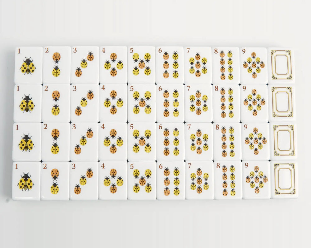 Golden Wilds ladybug Dot suit tiles arranged from one through nine