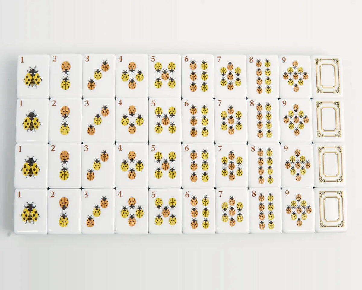 Golden Wilds ladybug Dot suit tiles arranged from one through nine