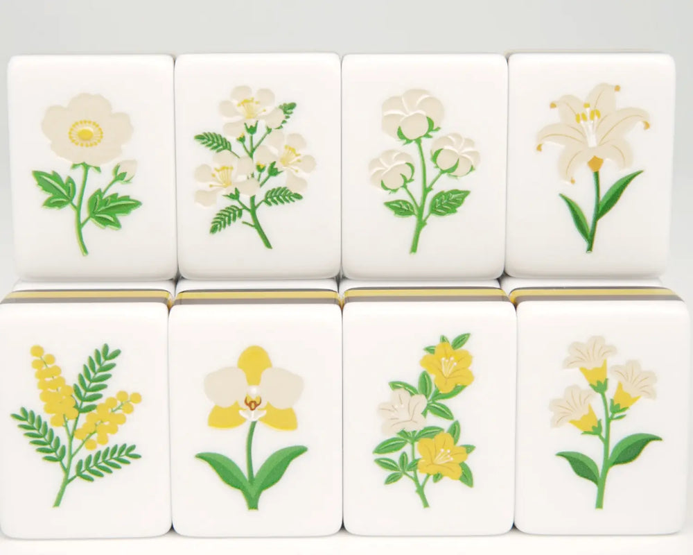 Golden Wilds floral Mahjong tiles with eight yellow and cream flower designs