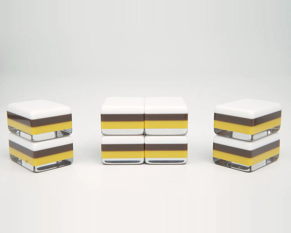 Side profile showing Golden Wilds white, deep brown, yellow and clear tile layers