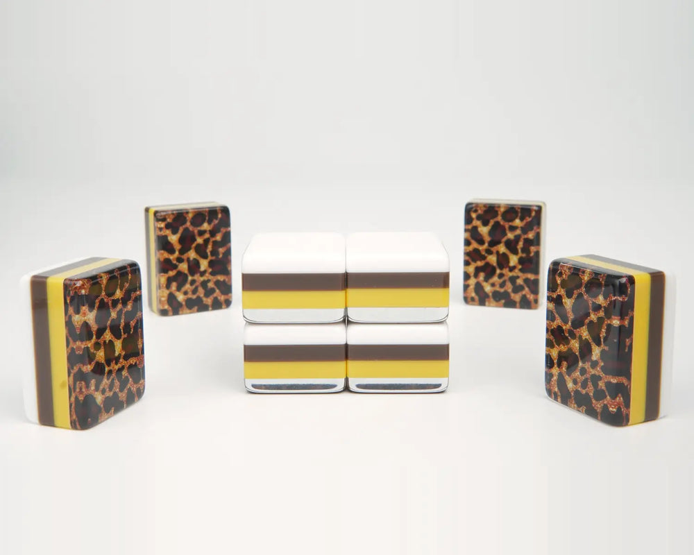 Golden Wilds leopard-print tile backs alongside layered side profiles