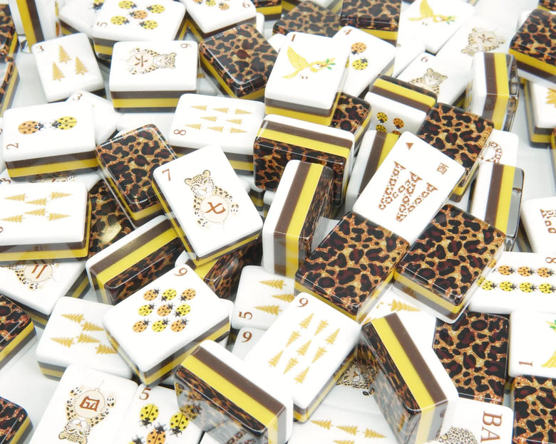 Overhead flat lay of Golden Wilds American Mahjong tiles
