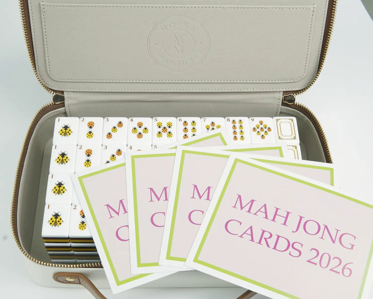 Golden Wilds Mahjong tiles inside the reusable storage case with Mahjong Cards 2026 cards