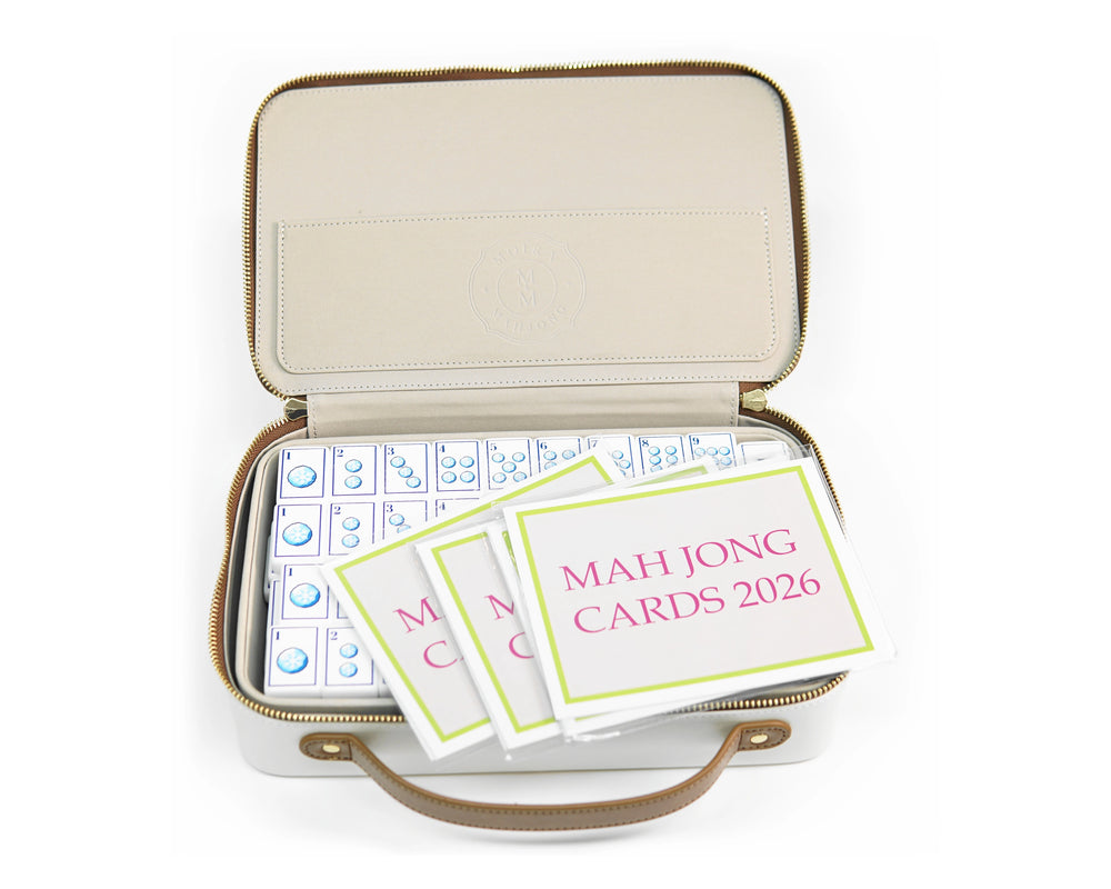 Alpine Slopes mahjong tiles in the open cream storage case with included table reference cards