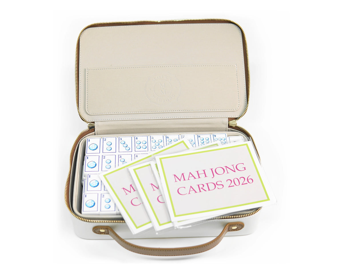 Alpine Slopes mahjong tiles in the open cream storage case with included table reference cards