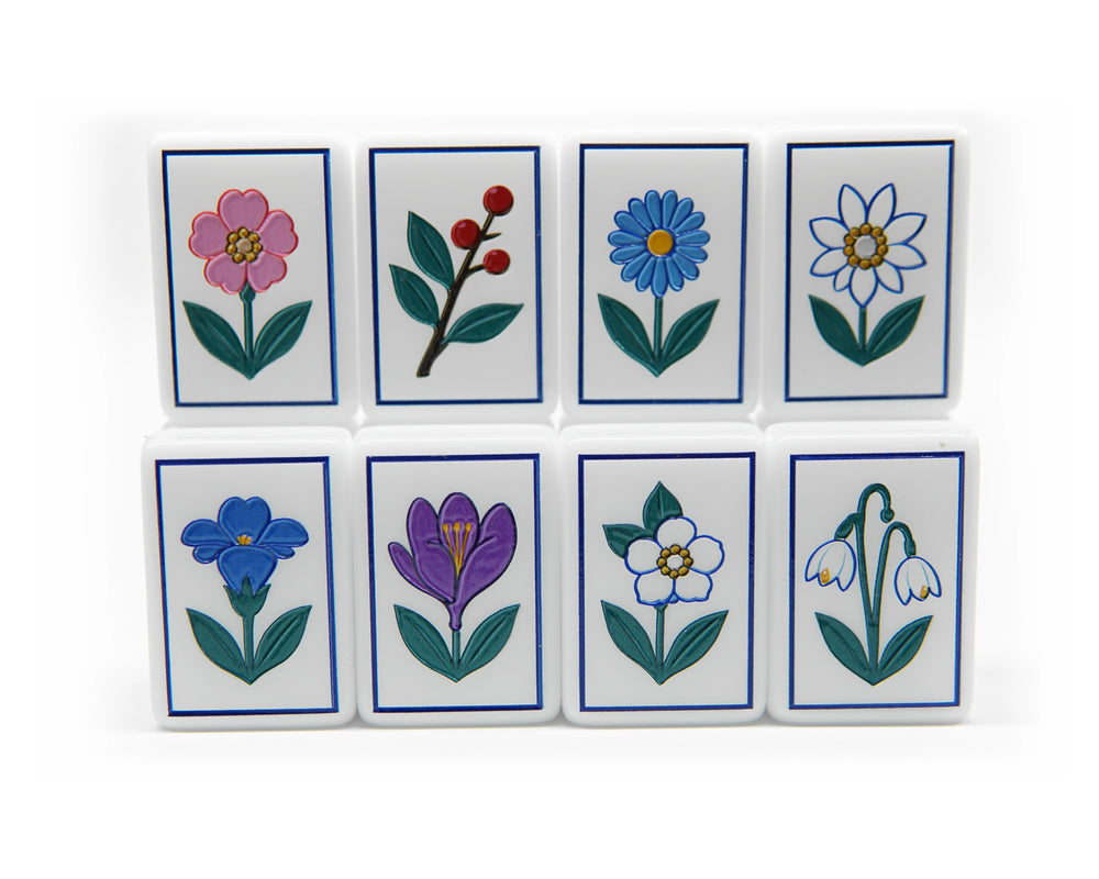 All eight Alpine Slopes Flower tiles with colorful botanical illustrations